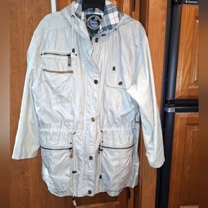 A GFC Trading Co. Light colored hooded coat in a ladies size medium.